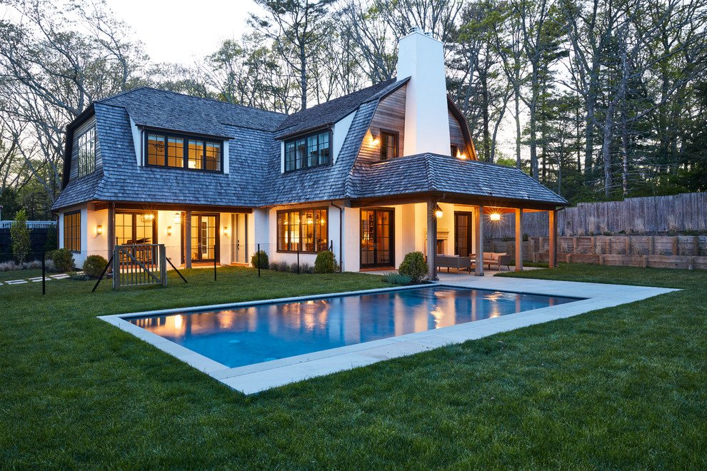 This is an example of a large farmhouse swimming pool in New York.