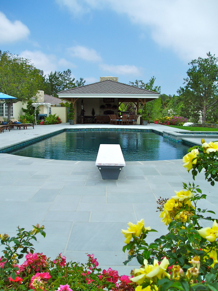 Inspiration for a timeless backyard concrete paver pool remodel in San Diego