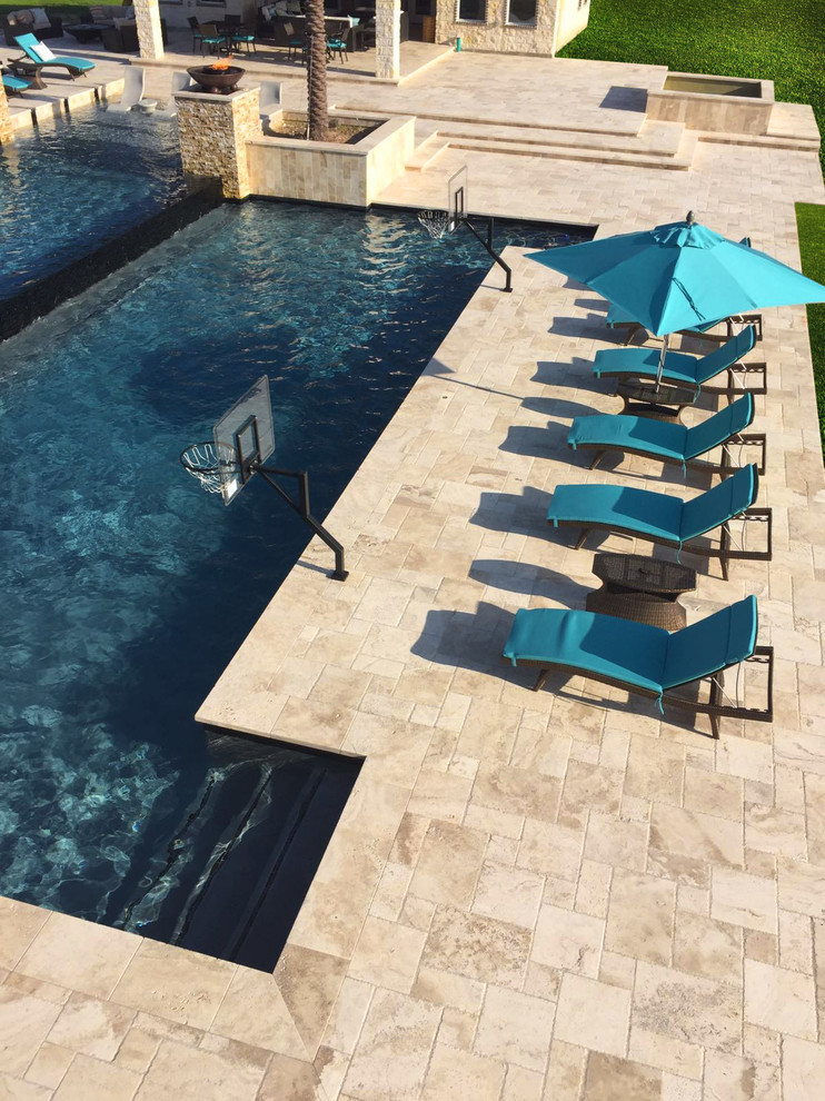 Mid-sized transitional backyard tile and custom-shaped lap hot tub photo in Orlando