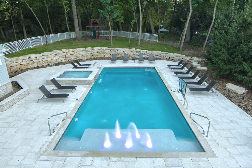 Rectilinear Outdoor Inground Swimming Pool with Water Features Traditional Pool Chicago