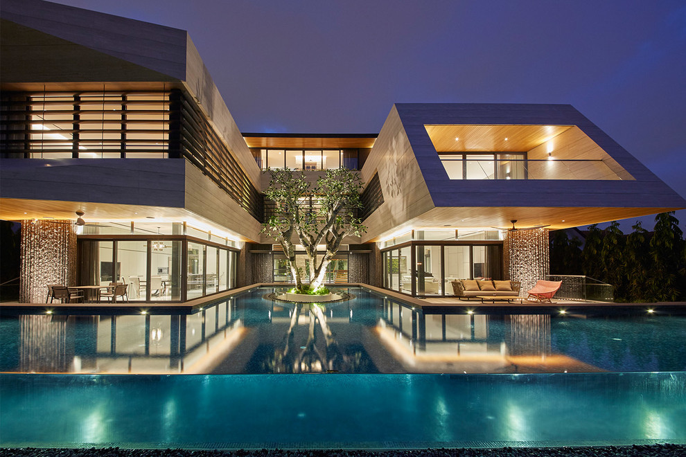 Ispirazione per una piscina fuori terra minimal personalizzata dietro casa