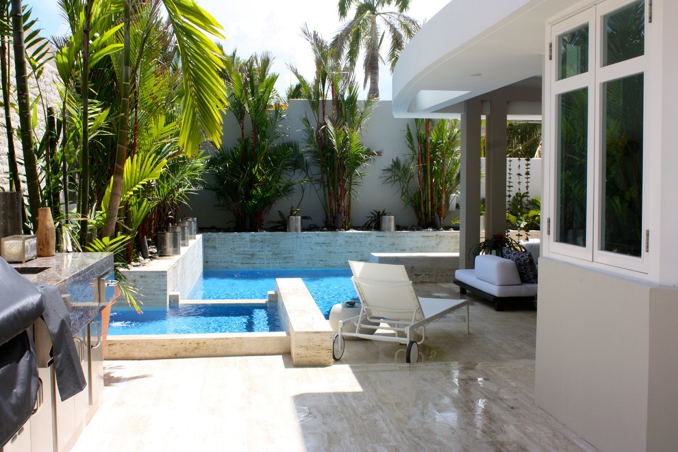 This is an example of a contemporary swimming pool in Other.