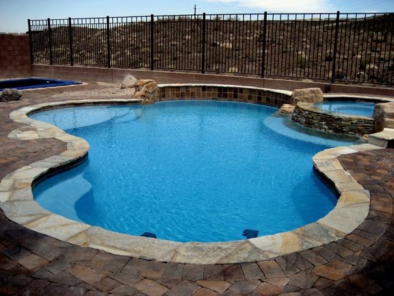Design ideas for a traditional swimming pool in Las Vegas.
