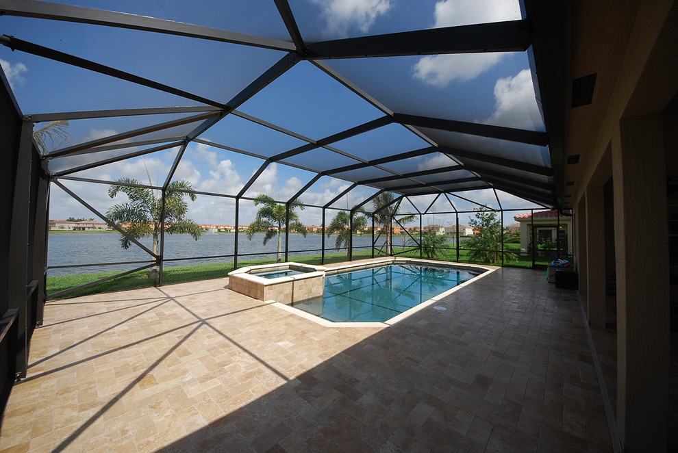 Photo of a contemporary swimming pool in Miami.