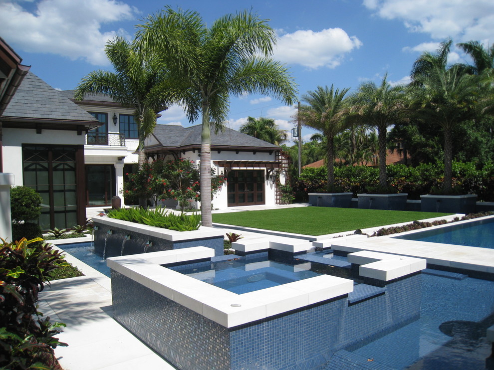 Pool - contemporary custom-shaped pool idea in Miami