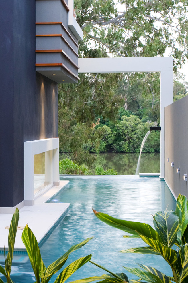 Pool - contemporary courtyard l-shaped pool idea in Brisbane