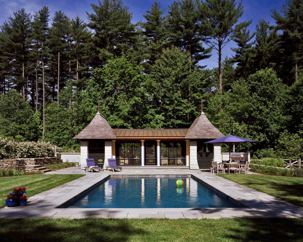 Photo of a classic rectangular swimming pool in Boston with a bbq area.