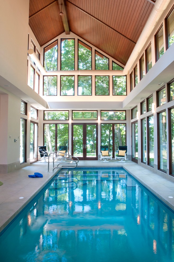 Medium sized rustic indoor rectangular swimming pool in Grand Rapids.