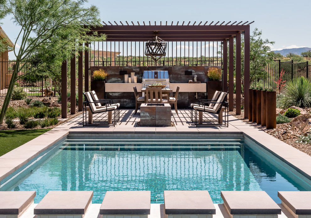 Inspiration for a small contemporary backyard concrete paver and rectangular lap hot tub remodel in Phoenix