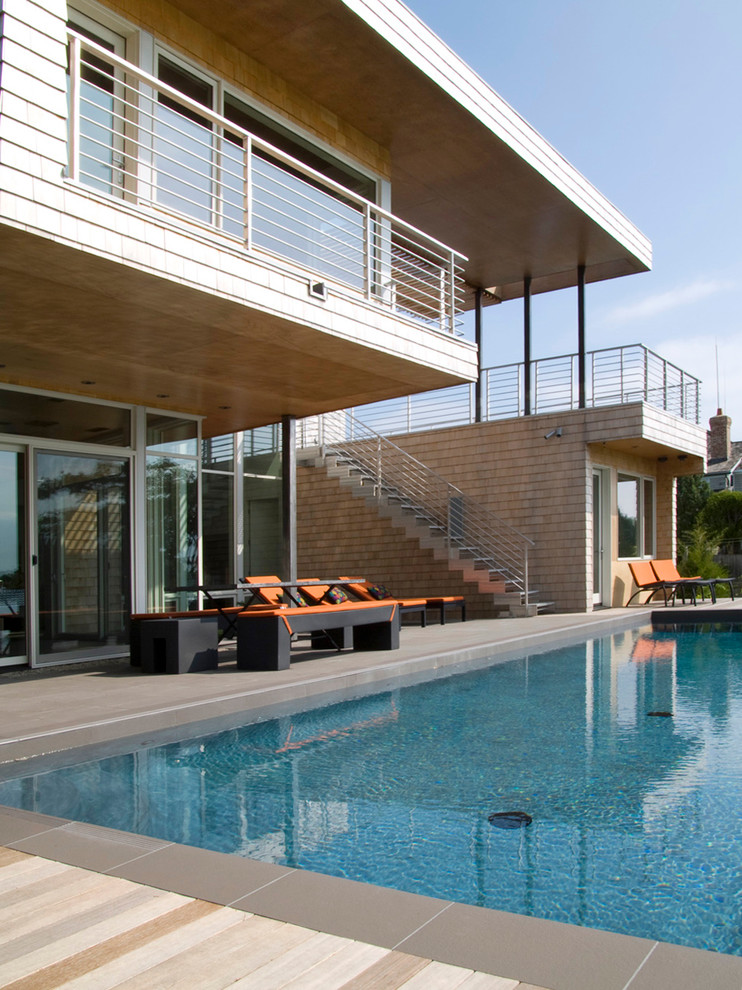 Inspiration for a contemporary rectangular pool remodel in New York