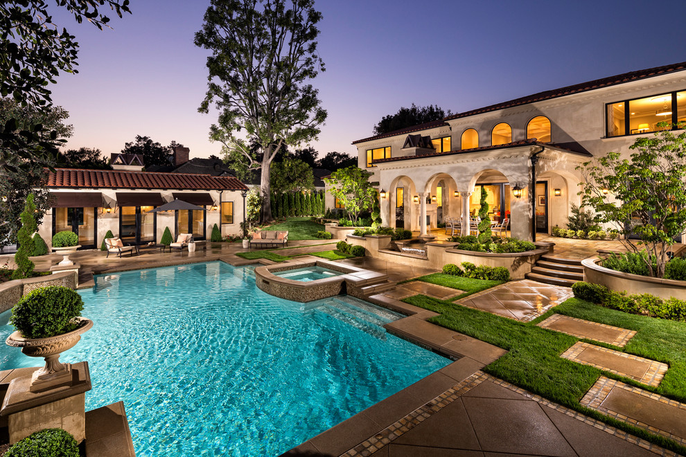 Inspiration for a mediterranean custom-shaped pool remodel in Los Angeles