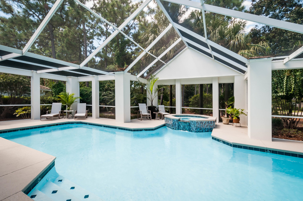 Pool house - large transitional indoor stamped concrete and custom-shaped pool house idea in Miami