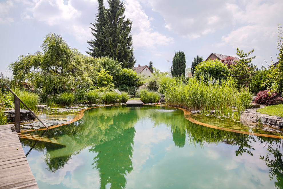 Inspiration for a farmhouse pool remodel in Stuttgart