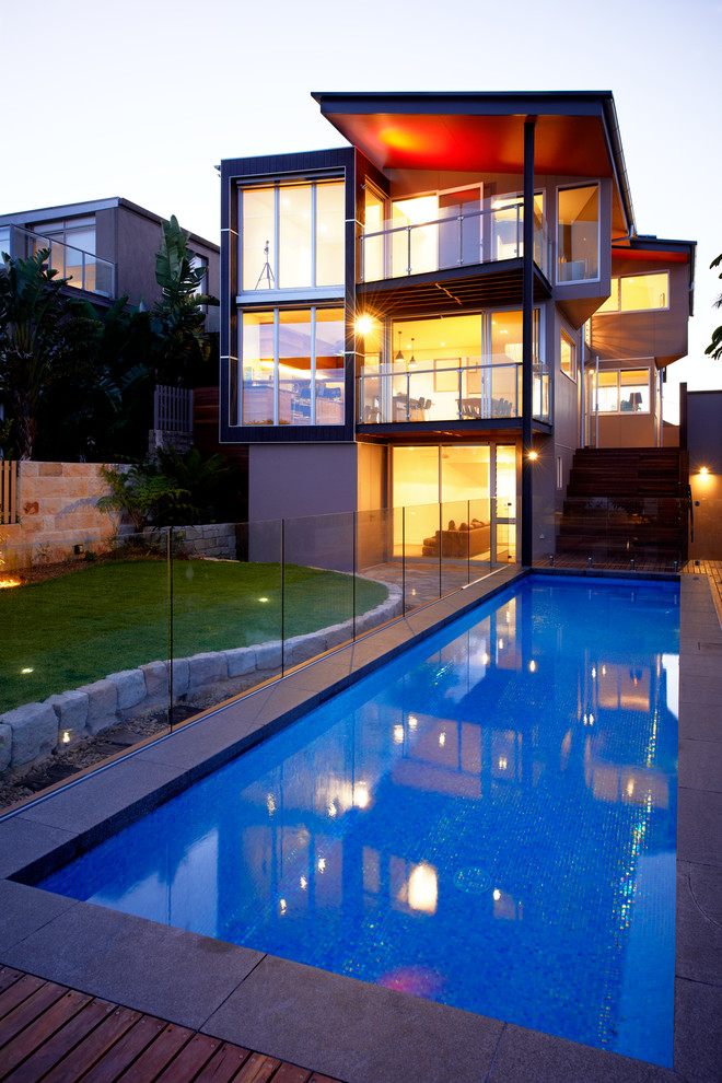 Pool - mid-sized contemporary backyard rectangular and concrete paver lap pool idea in Sydney