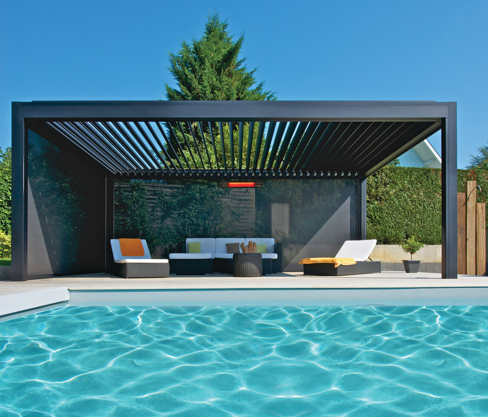 This is an example of a contemporary swimming pool in Other.