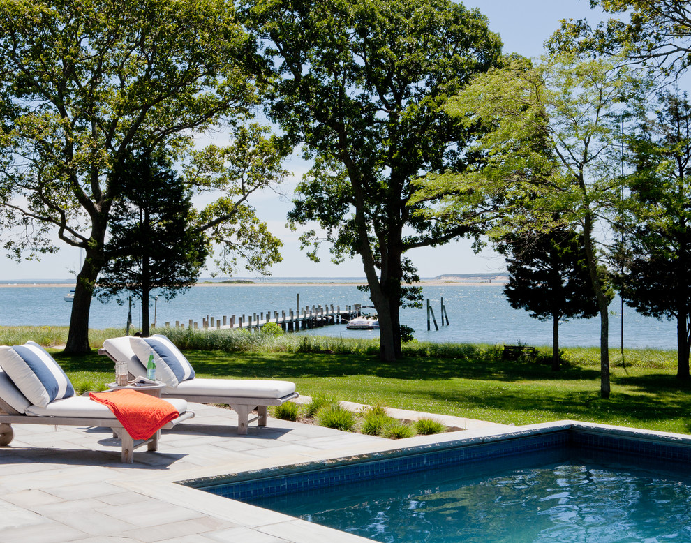 Beach style rectangular pool photo in New York