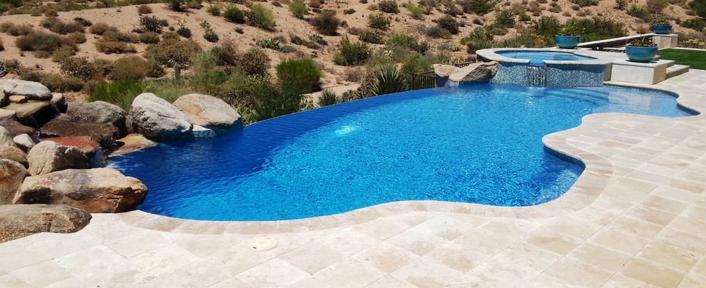Design ideas for a traditional swimming pool in Phoenix.