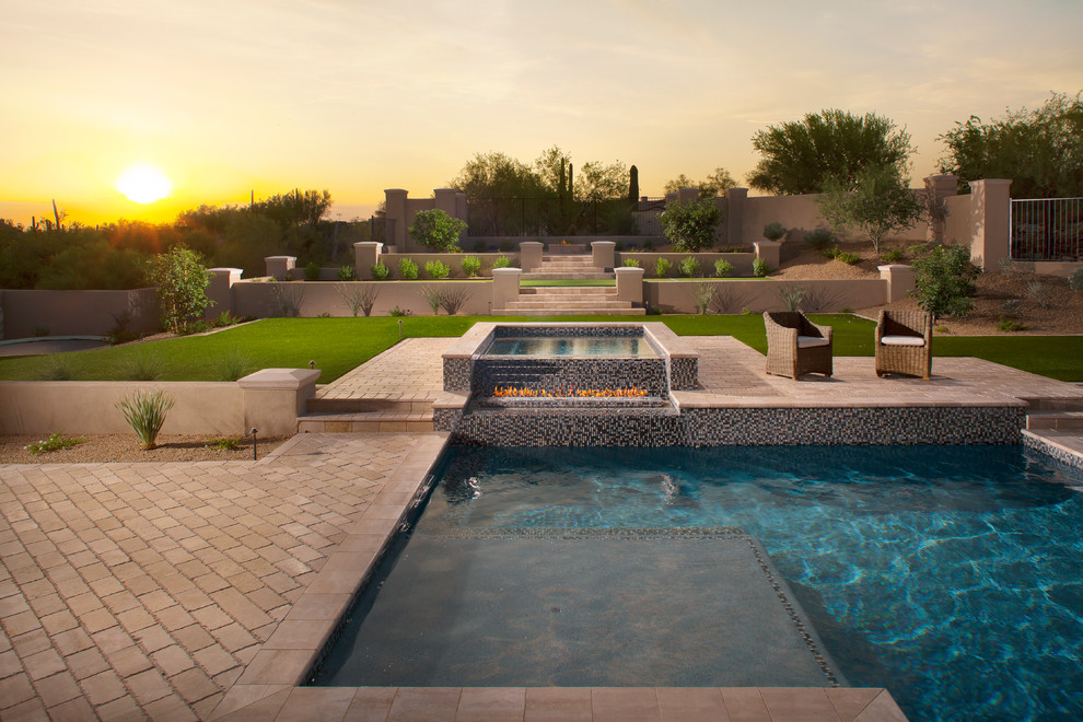 Inspiration for a contemporary backyard pool remodel in Phoenix
