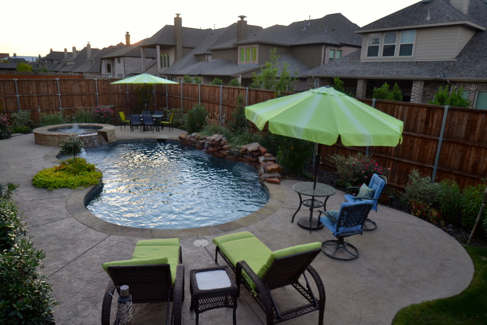 Pool - small rustic backyard custom-shaped pool idea in Dallas