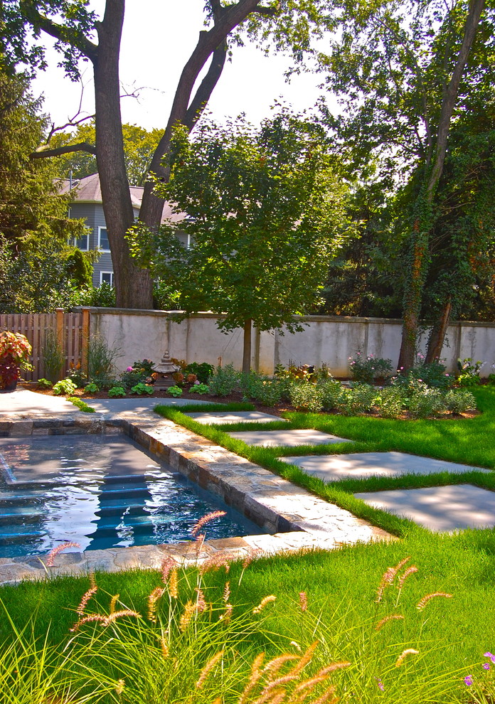 This is an example of a traditional rectangular swimming pool in New York.