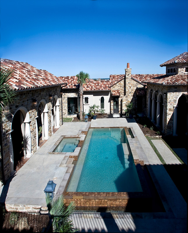 Photo of a traditional swimming pool in Dallas.