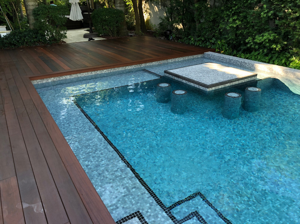 Cette photo montre un Abris de piscine et pool houses arrière tendance de taille moyenne et rectangle.