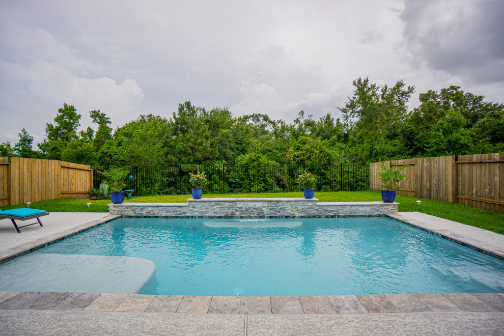 Idee per una piscina classica rettangolare di medie dimensioni e dietro casa