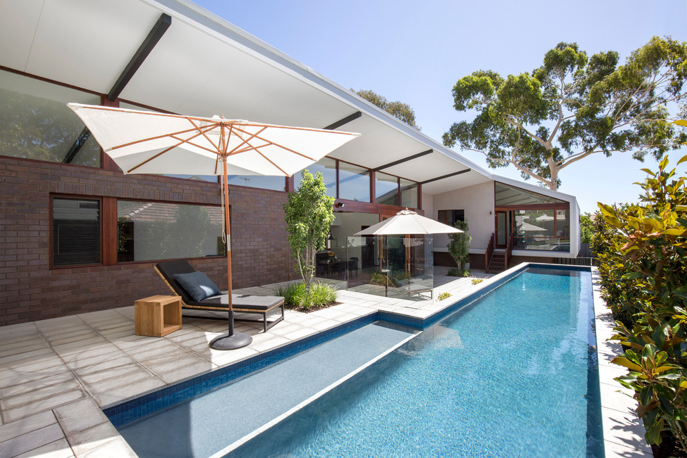 Design ideas for a contemporary rectangular lengths swimming pool in Perth.