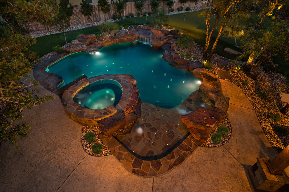 This is an example of a rustic swimming pool in Austin.