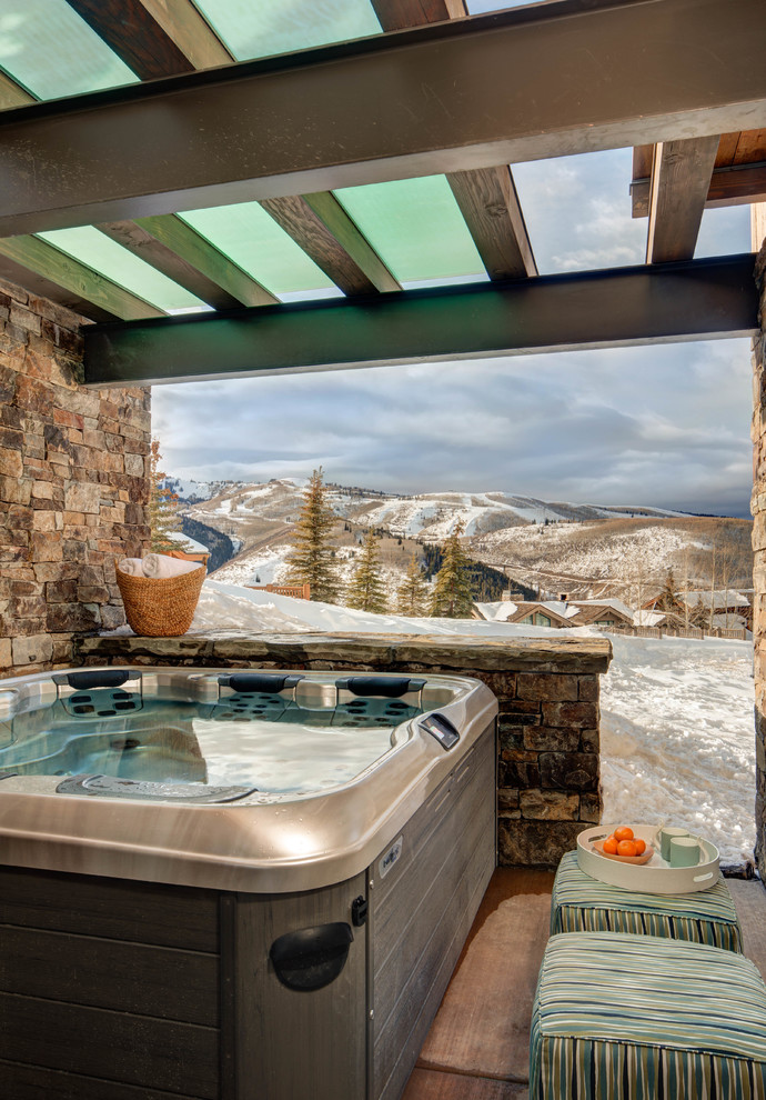 Mountain style hot tub photo in Salt Lake City