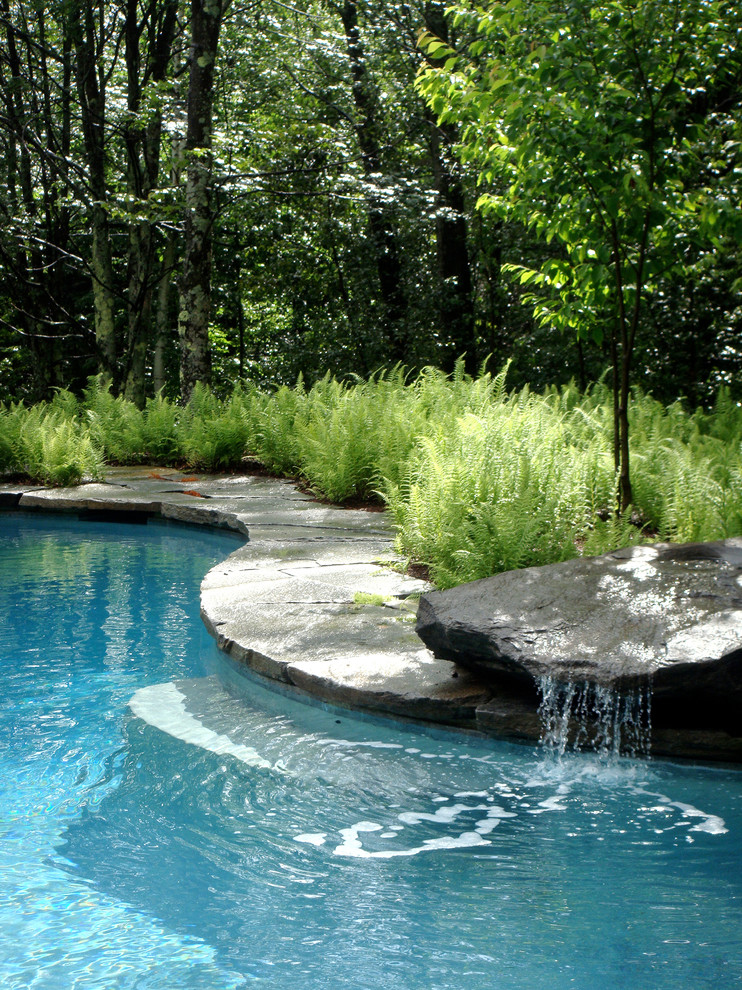 Example of a classic custom-shaped pool fountain design in Burlington
