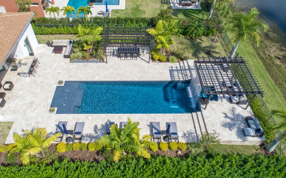Straight Edge Pool in Parkland Florida with Custom Pergola and Tile Pool Miami by Van Kirk
