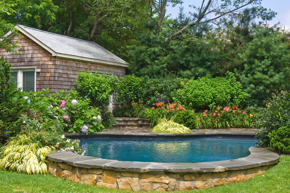 Design ideas for a rustic back swimming pool in New York.