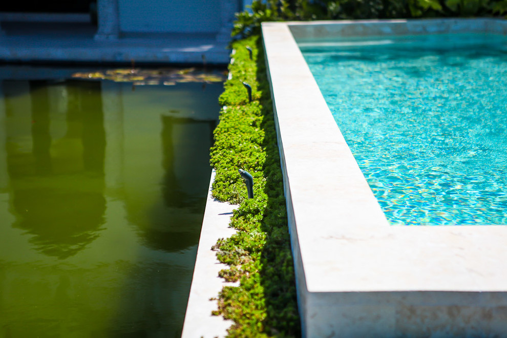 Tuscan pool photo in Miami