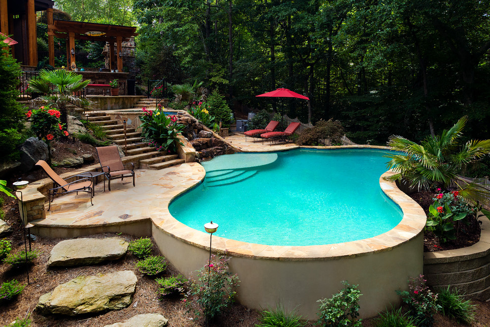 Inspiration for a tropical pool remodel in Atlanta