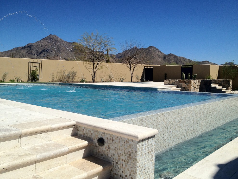 Inspiration for a mediterranean swimming pool in Phoenix.