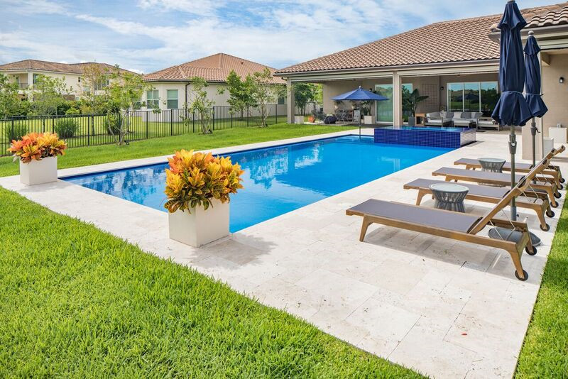 Swimming Pool with Wet Edge Raised Spa in West Palm Beach, Florida