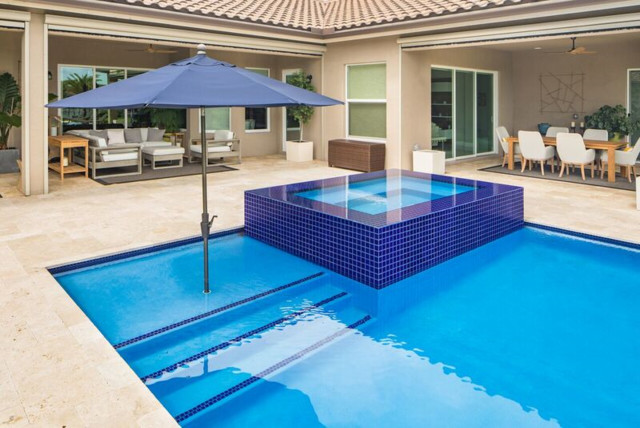 Swimming Pool with Wet Edge Raised Spa in West Palm Beach, Florida - Modern  - Swimming Pool & Hot Tub - Miami - by Van Kirk & Sons Pools and Spas |  Houzz IE