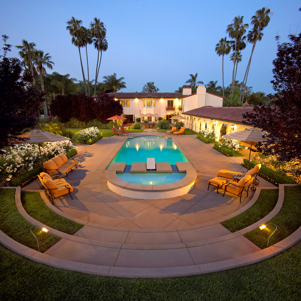 Pool - large traditional backyard concrete and rectangular lap pool idea in Los Angeles