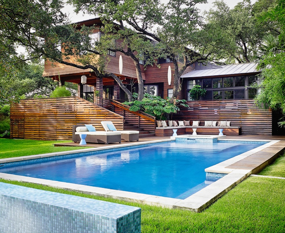 Design ideas for a contemporary swimming pool in Austin.