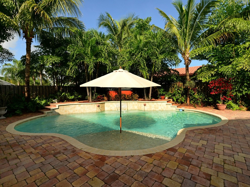 Tequesta Beach Style Patio & Pool Beach Style Pool Miami by