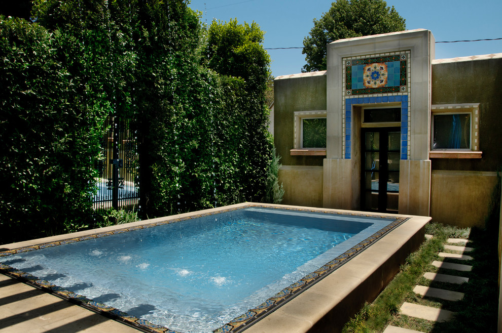 This is an example of a mediterranean rectangular swimming pool in Los Angeles.