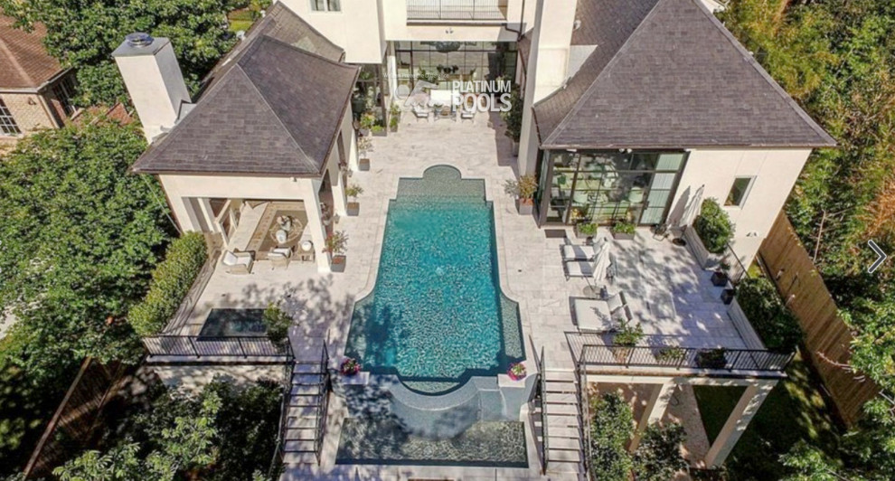 Immagine di una piscina minimal personalizzata dietro casa