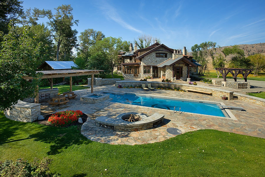 Inspiration for a rustic pool remodel in Calgary