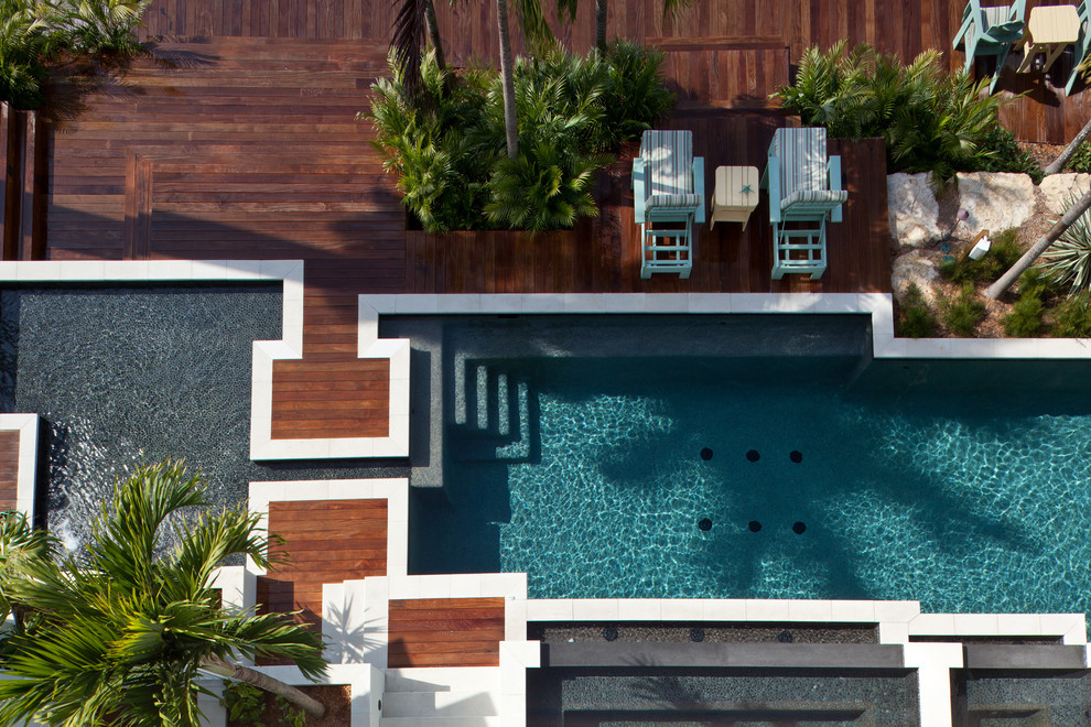 Inspiration for a world-inspired swimming pool in Miami with decking.