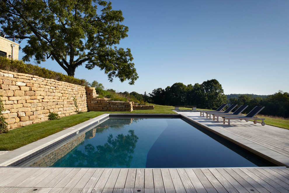 Inspiration for a country rectangular pool remodel in Milwaukee