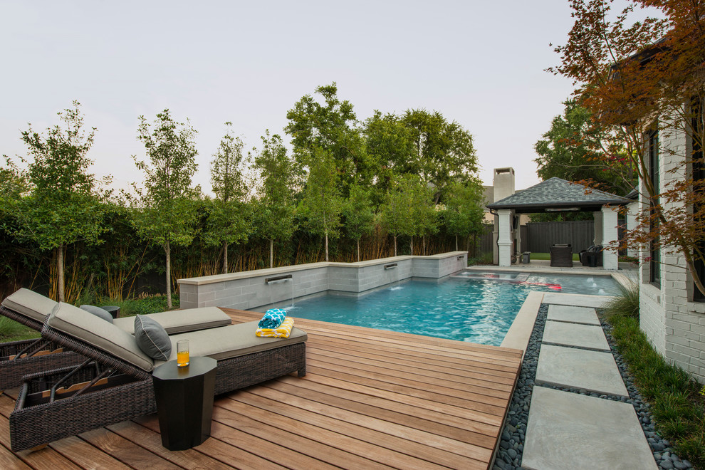 Mittelgroßer Moderner Pool hinter dem Haus in individueller Form mit Betonboden in Dallas