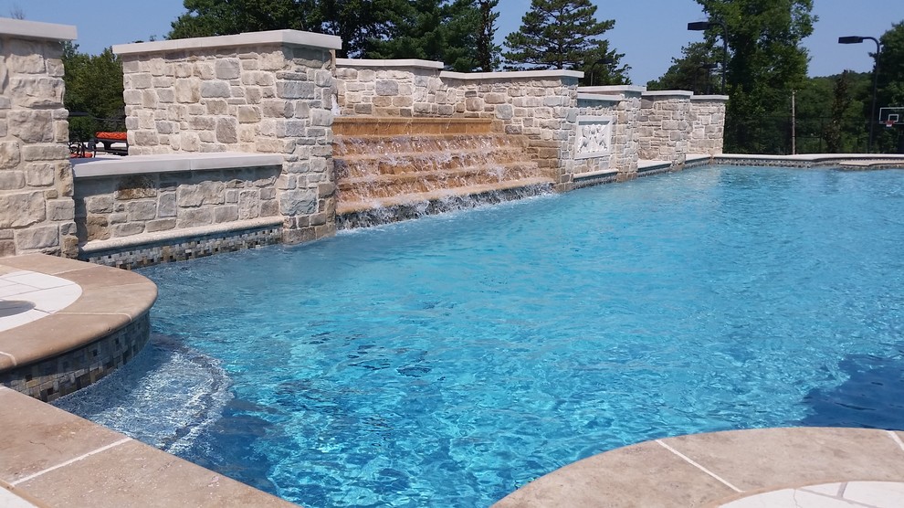Tiered Stone Waterfall W/ Custom Wall Sculpture - Traditional - Pool ...