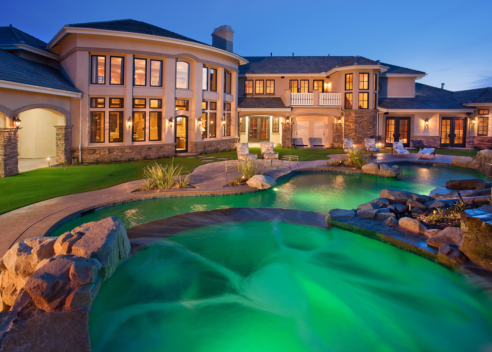 Elegant backyard custom-shaped pool photo in Los Angeles