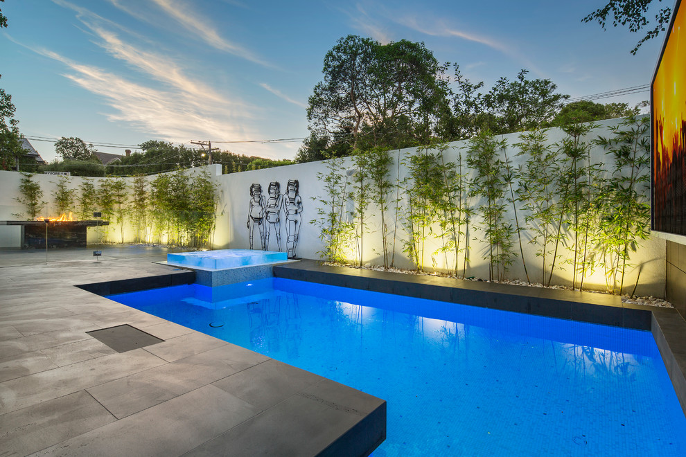 Mittelgroßer Moderner Pool hinter dem Haus in rechteckiger Form mit Betonboden in Melbourne